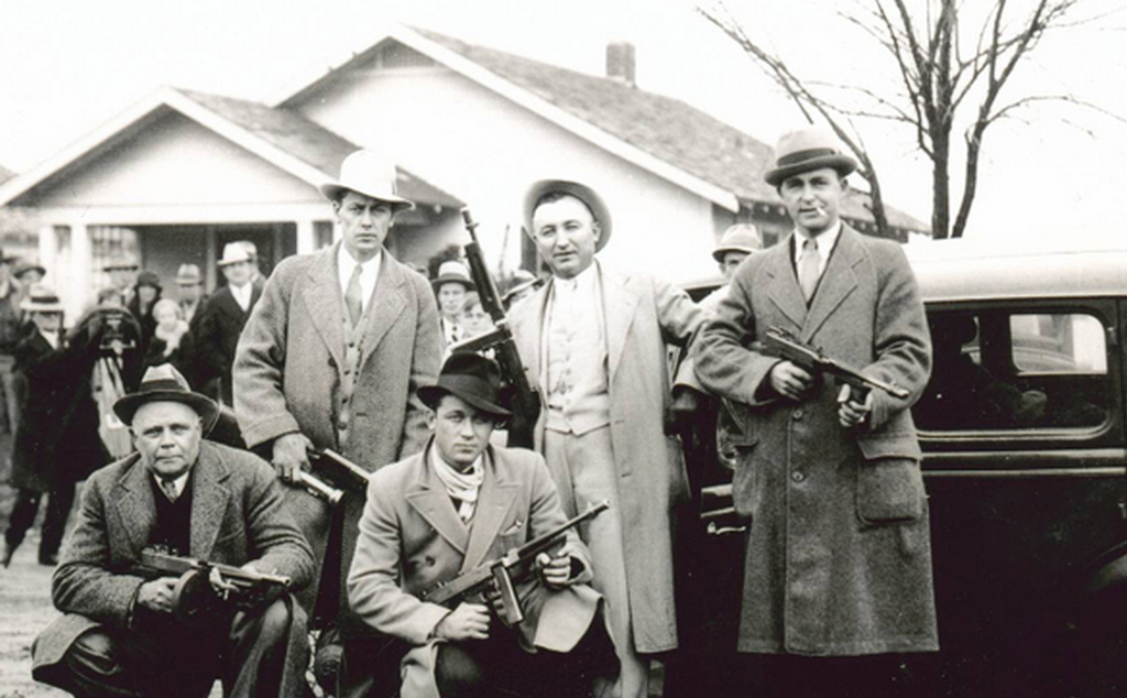 1930s_the_ocpd_raiding_squad_with_shotguns_and_tommy_guns.jpeg