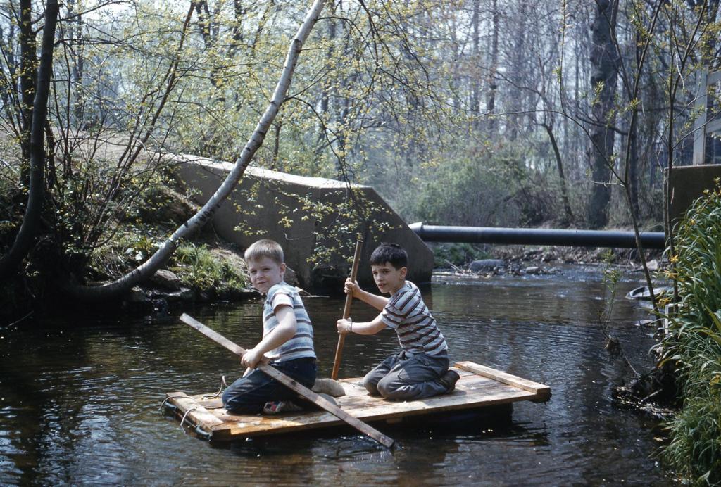 1955_korul_1950s_version_of_tom_huck_rafting_down_the_river_looking_for_adventure_and_treasure.jpeg