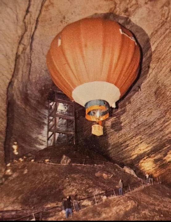 1963_balloonist_don_piccard_flies_a_hot_air_balloon_500_ft_underground_marvel_cave_branson_mo.jpeg