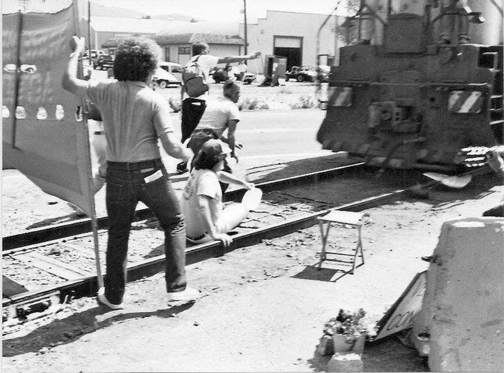 1987_s_brian_willson_moments_before_being_stuck_by_the_train.jpeg