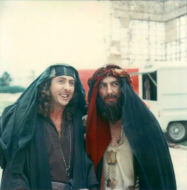 1978_eric_idle_and_george_harrison_on_the_monty_python_s_life_of_brian_set.jpg