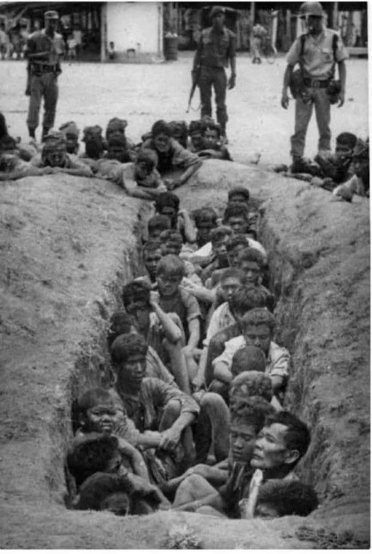 1965_during_indonesia_s_communist_sweep_men_were_waiting_to_be_sentenced_to_execution.jpeg