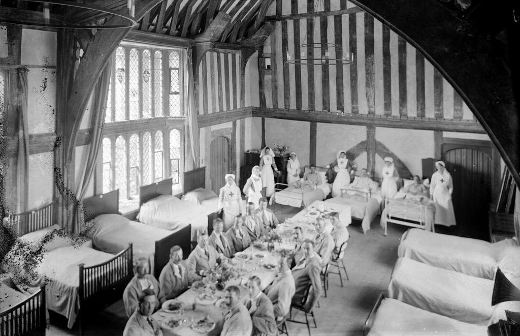 1916_nurses_caring_for_wounded_soldiers_treated_at_great_dixter_house_sussex_uk.jpeg