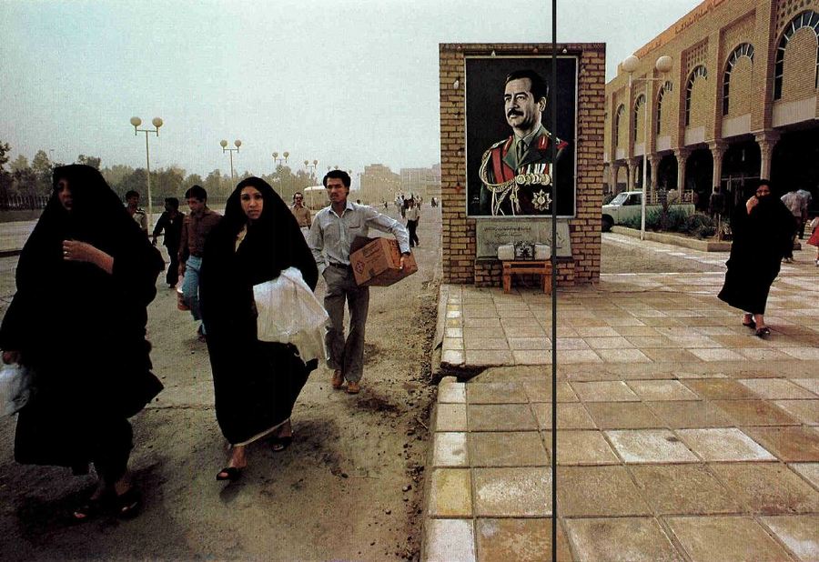 1985. Szaddam Husszein fotója egy újonnan nyitott bevásárlóközpont előtt, Bagdadban..jpg