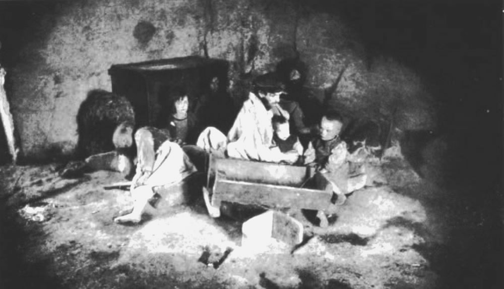 Starving-family-in-Carraroe-County-Galway-during-Great-Famine.jpg