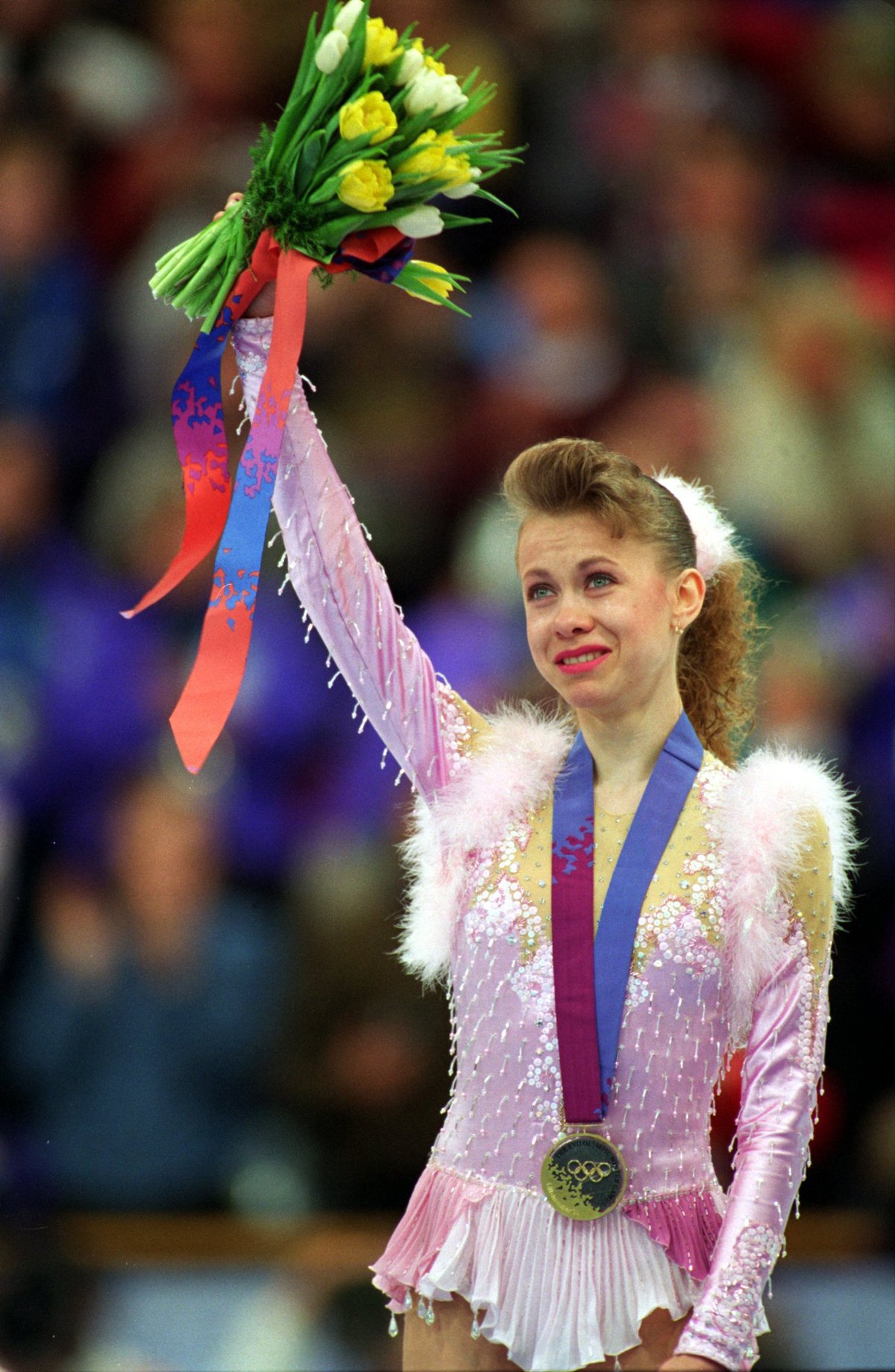 then-in-1994-oksana-baiul-won-the-gold-medal-for-ukraine-despite-an-injury-sustained-by-colliding-with-another-skater-in-practice[1].jpg