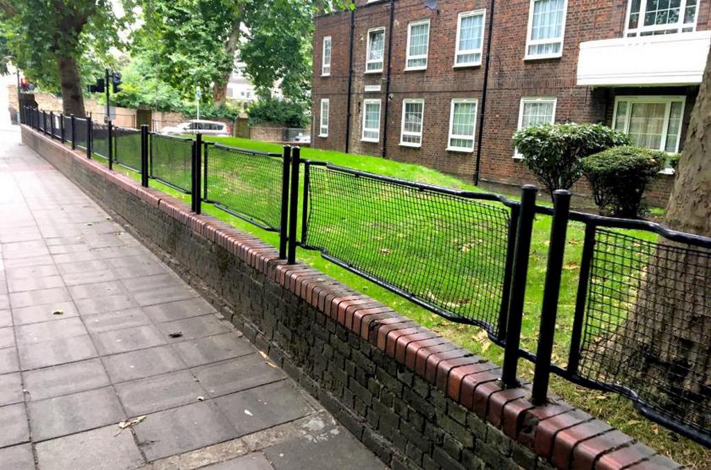 south_london_are_fences_made_out_of_ww2_stretchers_were_used_by_civil_authorities_to_transport_the_injured_during_the_blitz_they_are_what_remain_of_the_600_000_built_for_the_city_during_the_war.jpeg