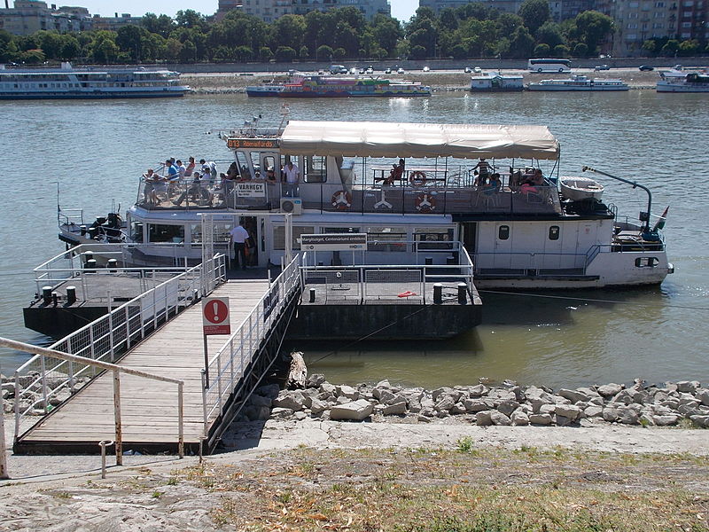 _d_13_toward_the_romai_furdo_quarter_centenariumi_emlekmu_ship_station_st_stephen_s_park_opposite_pest_side_margaret_island_budapest_hungary.JPG