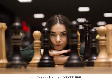 beautiful-girl-playing-chess-260nw-595031060.jpg