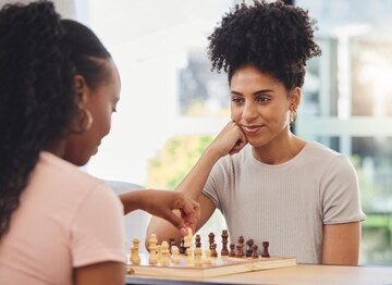 chess-game-women-with-board-thinking-strategy-challenge-friends-living-room-competition-planning-female-people-with-chessboard-playing-winning-checkmate-problem-solving_590464-204708.jpg