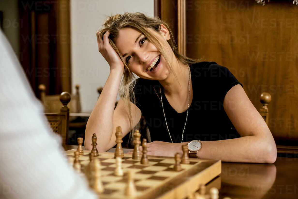 woman-having-fun-playing-chess-acpf00436.jpg