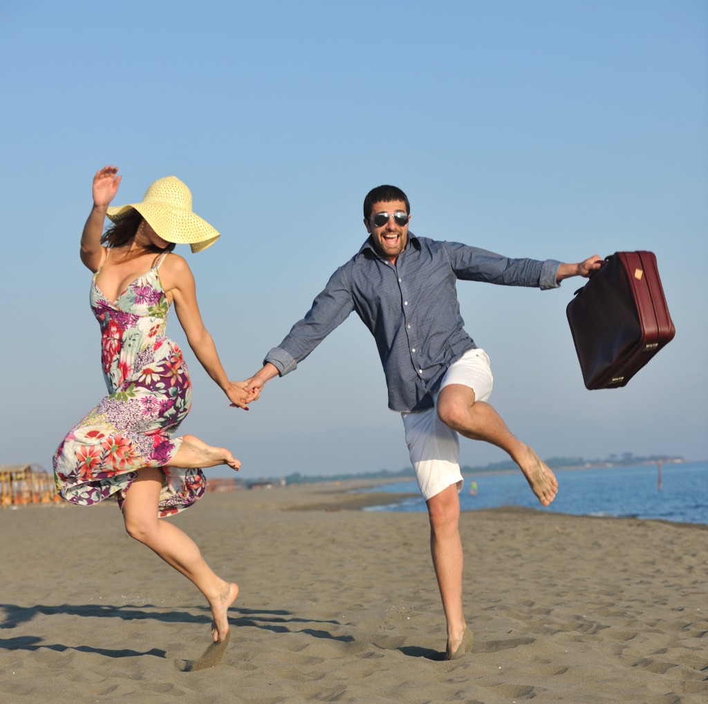 ii-happy-couple-with-suitcase-07292014-1024x1018.jpg