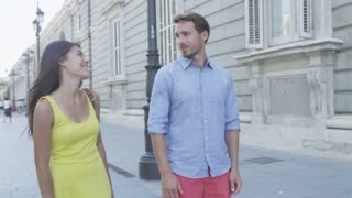 holdling-hands-man-taking-woman-hand-showing-love-smiling-happy-on-romantic-date-in-madrid-spain-couple-walking-in-front-of-royal-palace-of-madrid_s_ff1ozz1x_thumbnail-small01.jpg