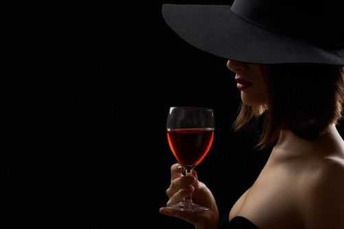 shot-sexy-woman-black-hat-hiding-her-face-drinking-wine_7502-5082.jpg