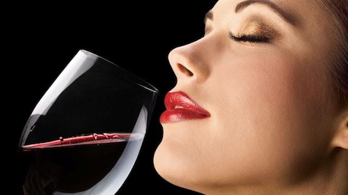 happy-woman-drinking-wine.jpg