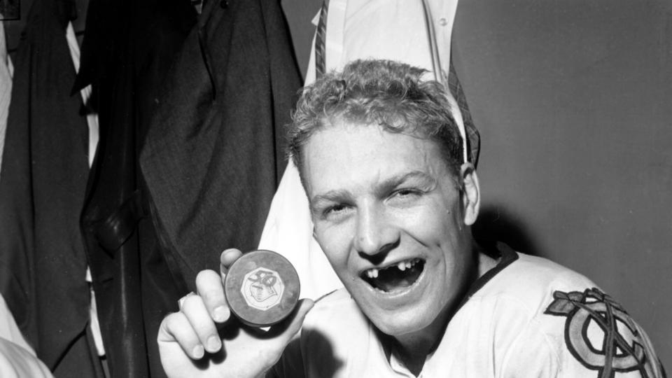 chicago_blackhawks_bobby_hull_holding_the_puck_he_hit_his_50th_goal_in_a_season_1962.jpg