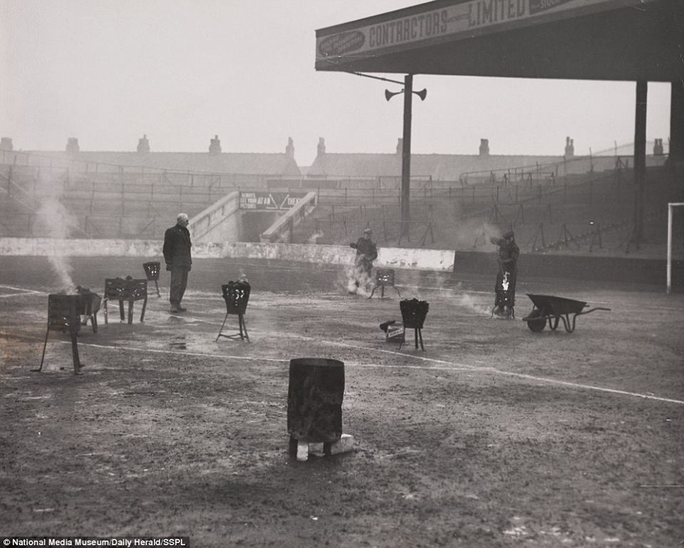 getting_the_game_on_thawing_out_manchester_city_s_football_ground_in_chilly_conditions_on_january_8_1953.jpg