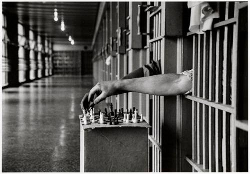 inmates_playing_chess_from_prison_cells_attica_correction_facility_new_york_1972.jpg