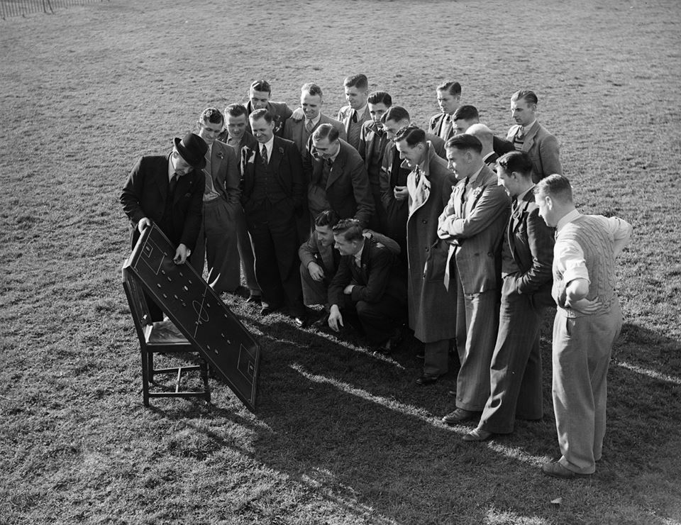 ipswich_town_players_have_a_meeting_to_discuss_tactics_1938.jpg