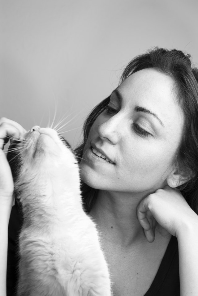 grayscale-photo-of-woman-and-cat-36027.jpg