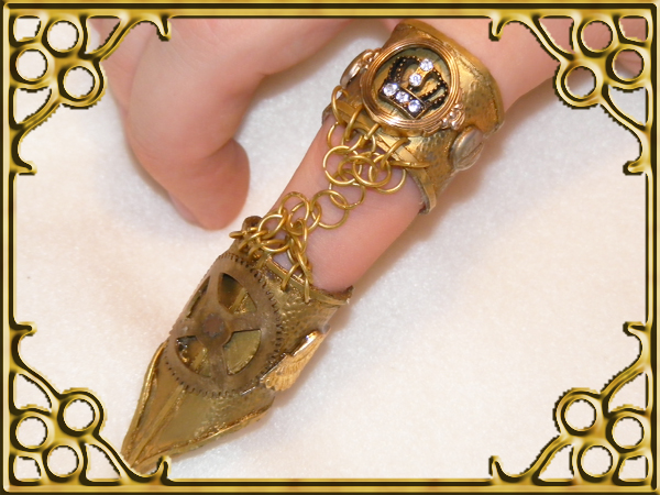 Golden_Steampunk_finger_ring_by_Teacat_Designs.jpg
