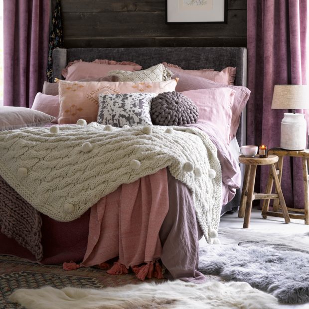 country-purple-bedroom-with-bed-and-cosy-throws-and-sheepskin-rug-620x620.jpg
