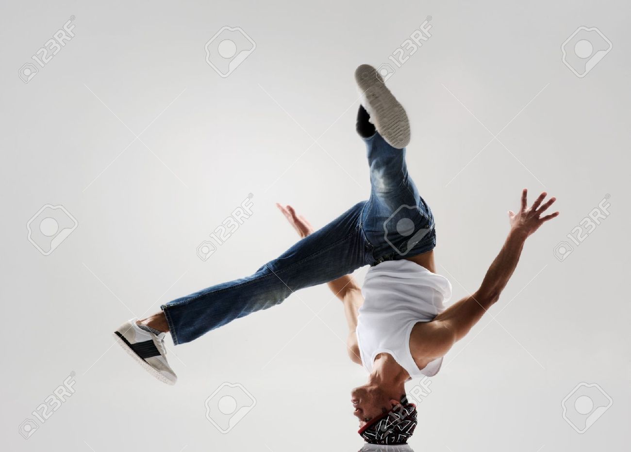 11899900-breakdancer-frozen-in-mid-head-spin-classic-modern-hip-hop-or-break-dance-move-stock-photo.jpg