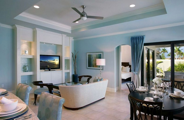 fascinating-square-tray-ceiling-with-flush-mounted-ceiling-fan-above-living-room-seating-area-plus-blue-wall-paint-color-background.jpg