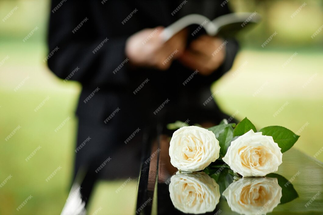 closeup-two-white-roses-coffin-funeral-ceremony_236854-45792.jpg