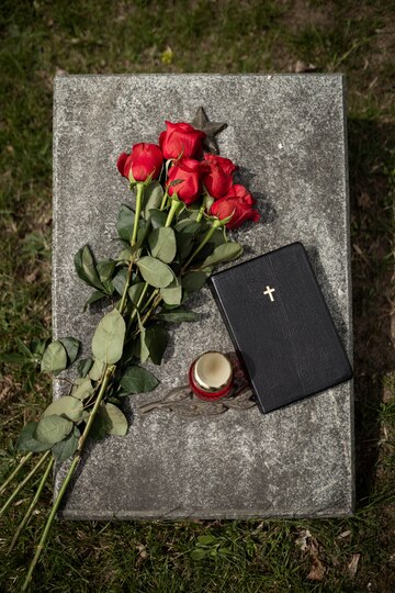 top-view-gravestone-with-flowers-candle_23-2149431276.jpg