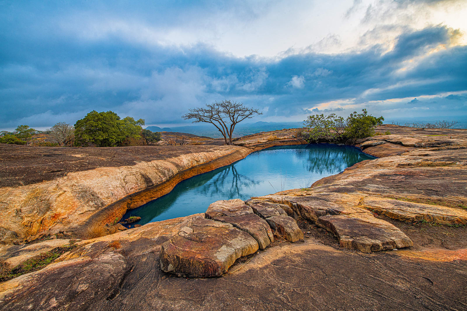 smocontemporaryart-kelechi-amadi-obi-iyake-suspended-lake-ado-awaye-hills-daytime-2022.jpg