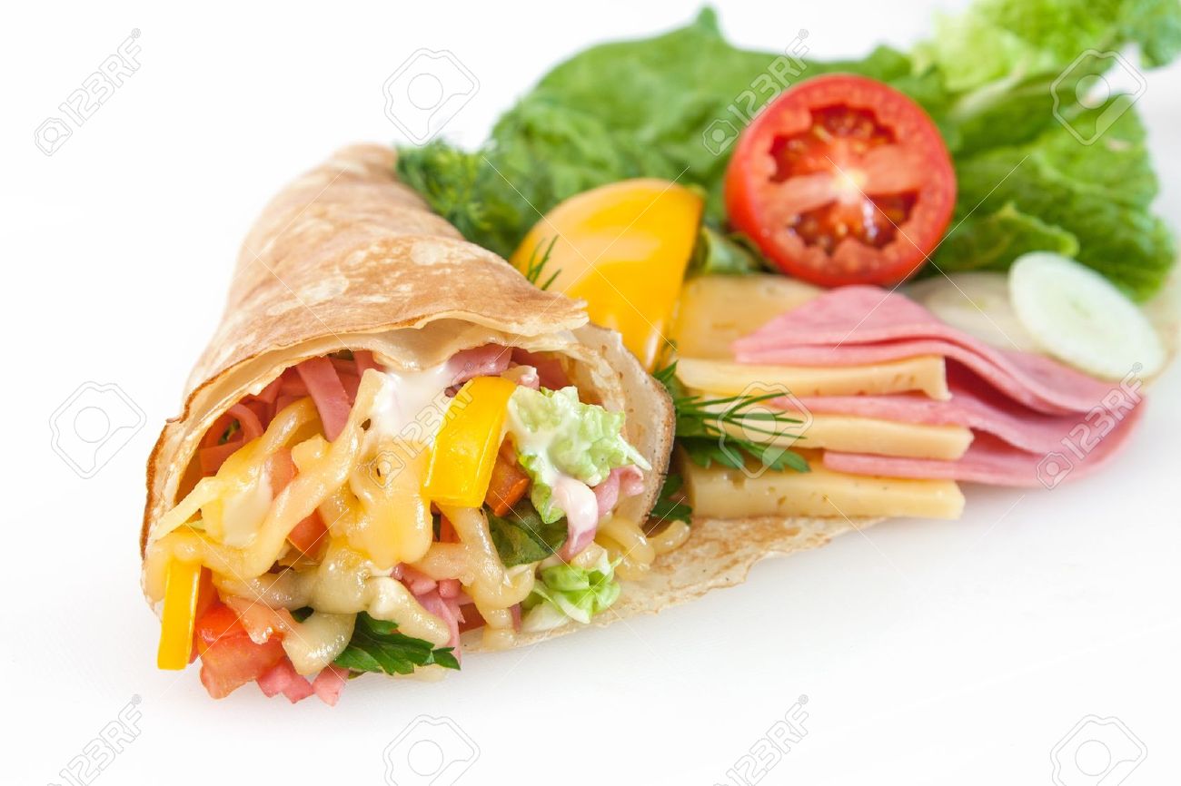 14714285-rolled-thin-pancakes-with-ham-cheese-and-vegetables-stock-photo.jpg