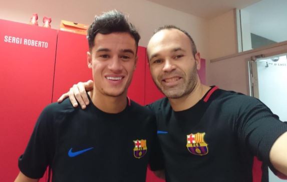 andres-iniesta-and-coutinho.jpg