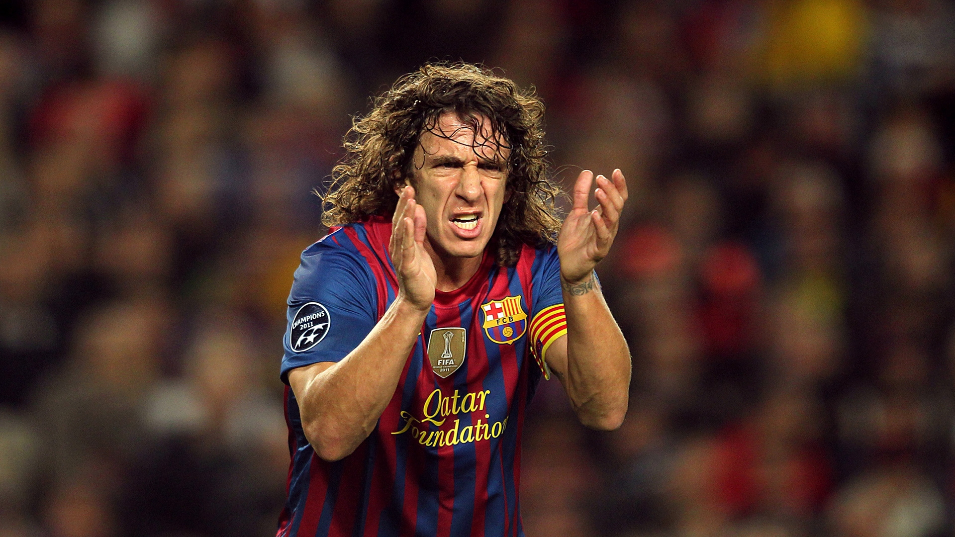 the_player_of_barcelona_carles_puyol_applauding.jpg