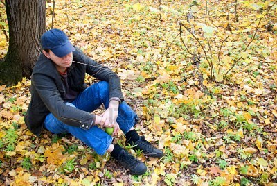 4604294-man-sitting-in-the-autumn-woods.jpg