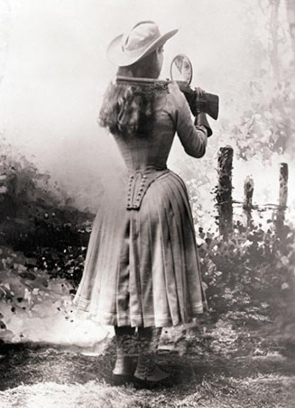 annieoakley-shooting-over-shoulder.jpg