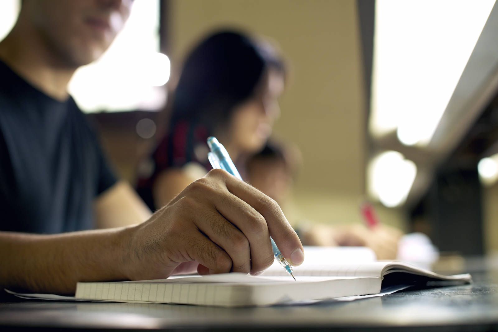 bigstock-young-man-doing-homework-and-s-45525031.jpg