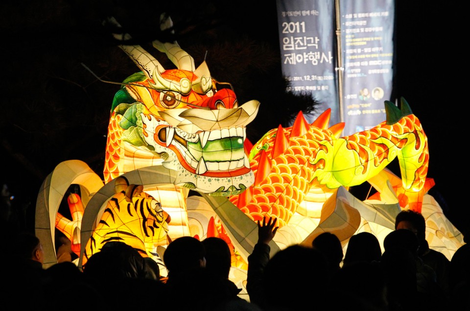 A-giant-dragon-lantern-is-displayed-to-celebrate-the-New-Year-near-the-border-village-of-Panmunjom-DMZ-that-separates-the-two-Koreas-since-the-Korean-War-at-Imjingak-Pavilion-in-Paju-South-Korea-Sunday-January-1-2012.jpg
