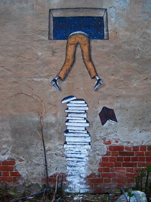 Street-Art-Climb-Over-Books.jpg