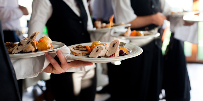 bigstock-waiters-carrying-plates-with-m-95742863-660x330.jpg