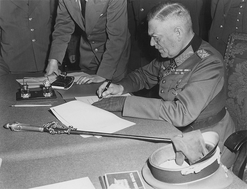 800px-field_marshall_keitel_signs_german_surrender_terms_in_berlin_8_may_1945_restoration.jpg