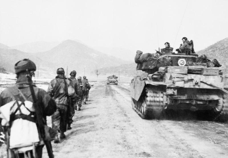 centurion_tanks_and_infantry_of_the_gloucestershire_regiment_advancing_to_attack_hill_327_in_korea_march_1951_bf454.jpg