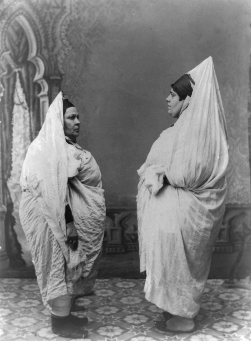 two_jewish_women_standing_facing_each_other_in_tunisia.png