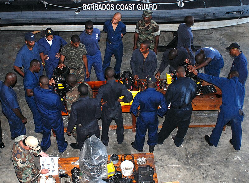us_navy_100817-n-4971l-021_members_of_the_royal_barbados_defense_force_disassemble_a_small_boat_engine_during_a_maintenance_management_subject_matter_expert_exchange.jpg