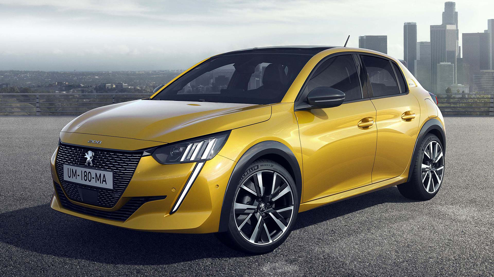 2019_peugeot_208_e_yellow.jpg