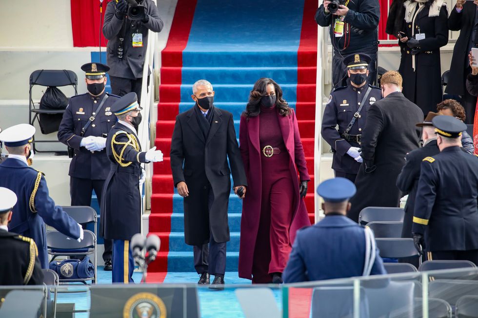 former-u-s-president-barack-obama-and-michelle-obama-at-the-news-photo-1611161299.jpg