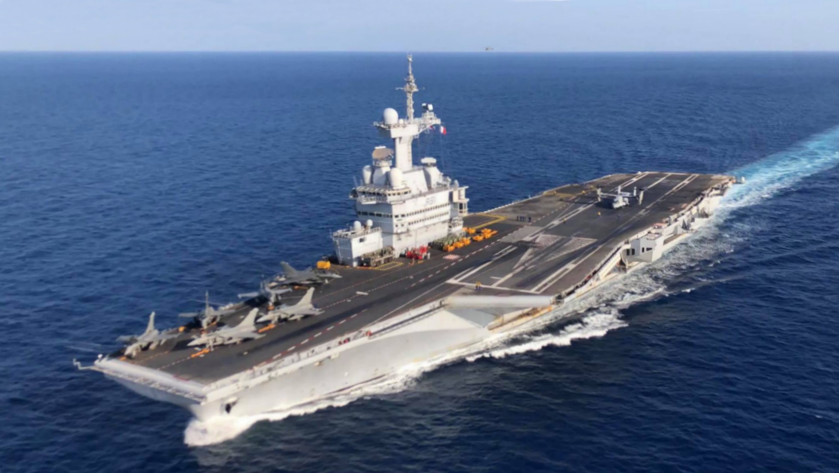 french_aircraft_carrier_charles_de_gaulle_r91_underway_on_24_april_2019_190424-m-bp588-1005.jpg