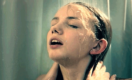 cassie-washing-face-in-shower-skins.gif