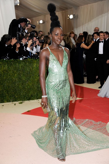 lupita_nyong_o_wore_a_calvin_klein_collection_gown_designed_in_collaboration_with_the_green_carpet_challenge_and_jewellery_by_tiffany_co.jpg