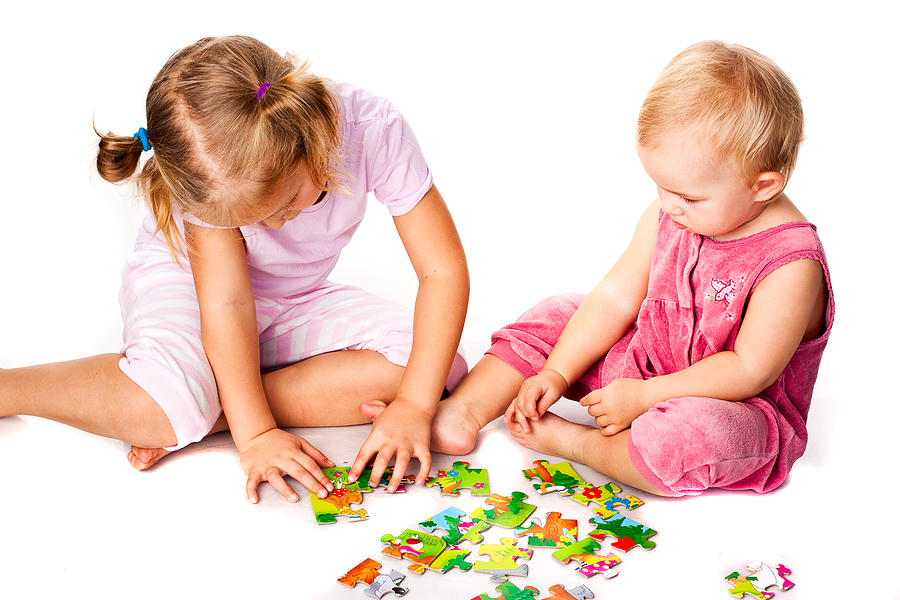 bigstock-children-solving-jigsaw-puzzle-10846823.jpg